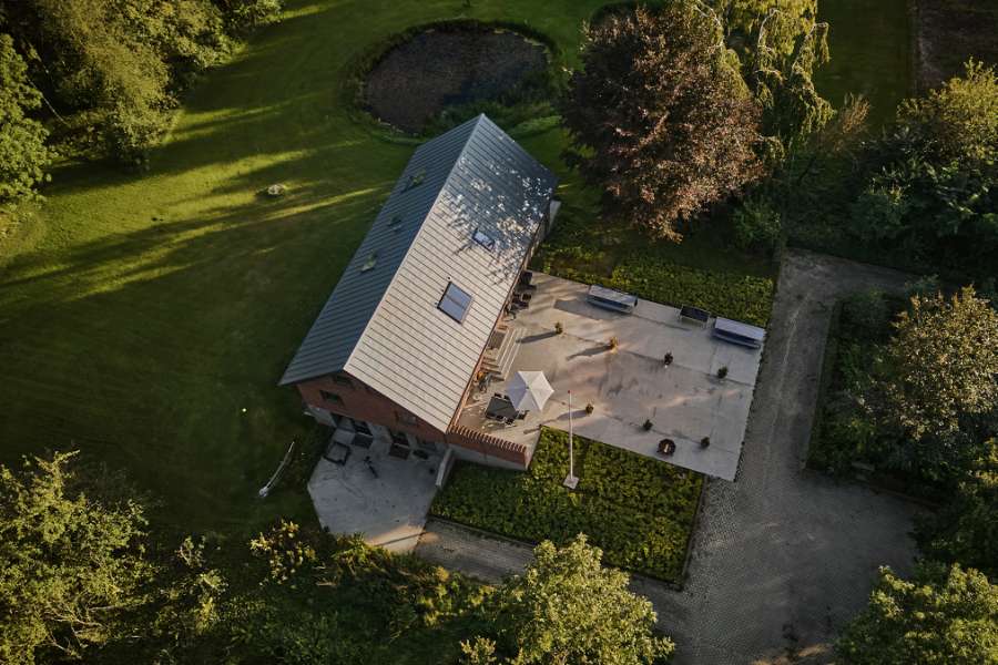Summer light settles over steel profiles in the forest, Klæstruplundvej 11, 9240 Nibe, Denmark